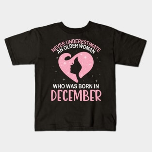 Never Underestimate An Older Woman Who Was Born In December Happy Birthday To Me Nana Mom Daughter Kids T-Shirt